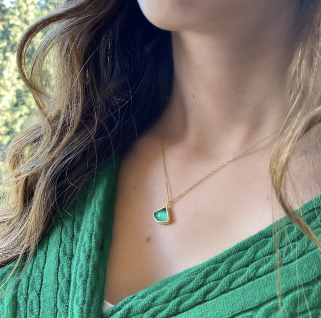 Elegant and beautiful pendant with a bezel set triangular green agate-quartz doublet stone on a delicate gold chain.