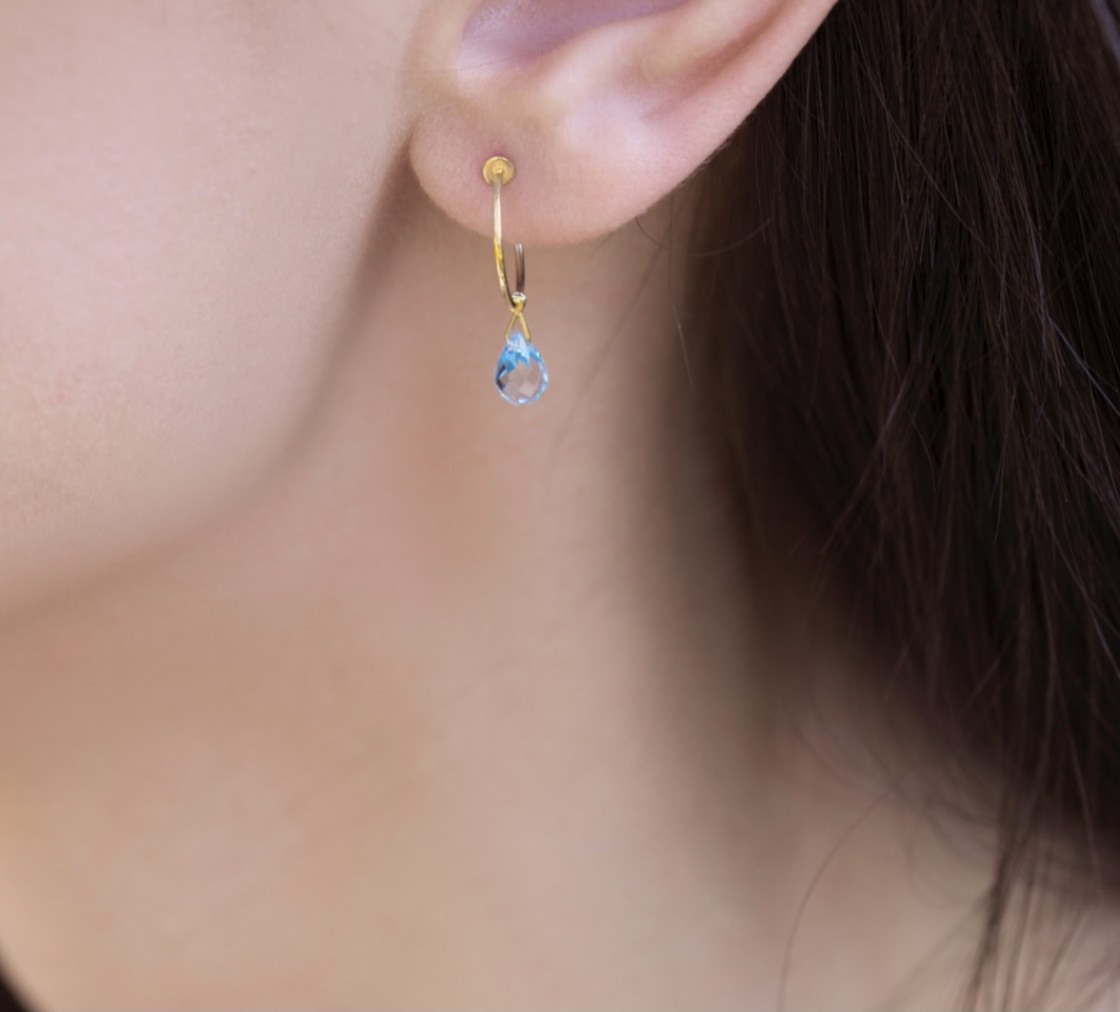 Little gold hoops with a drop cut aquamarine stone.