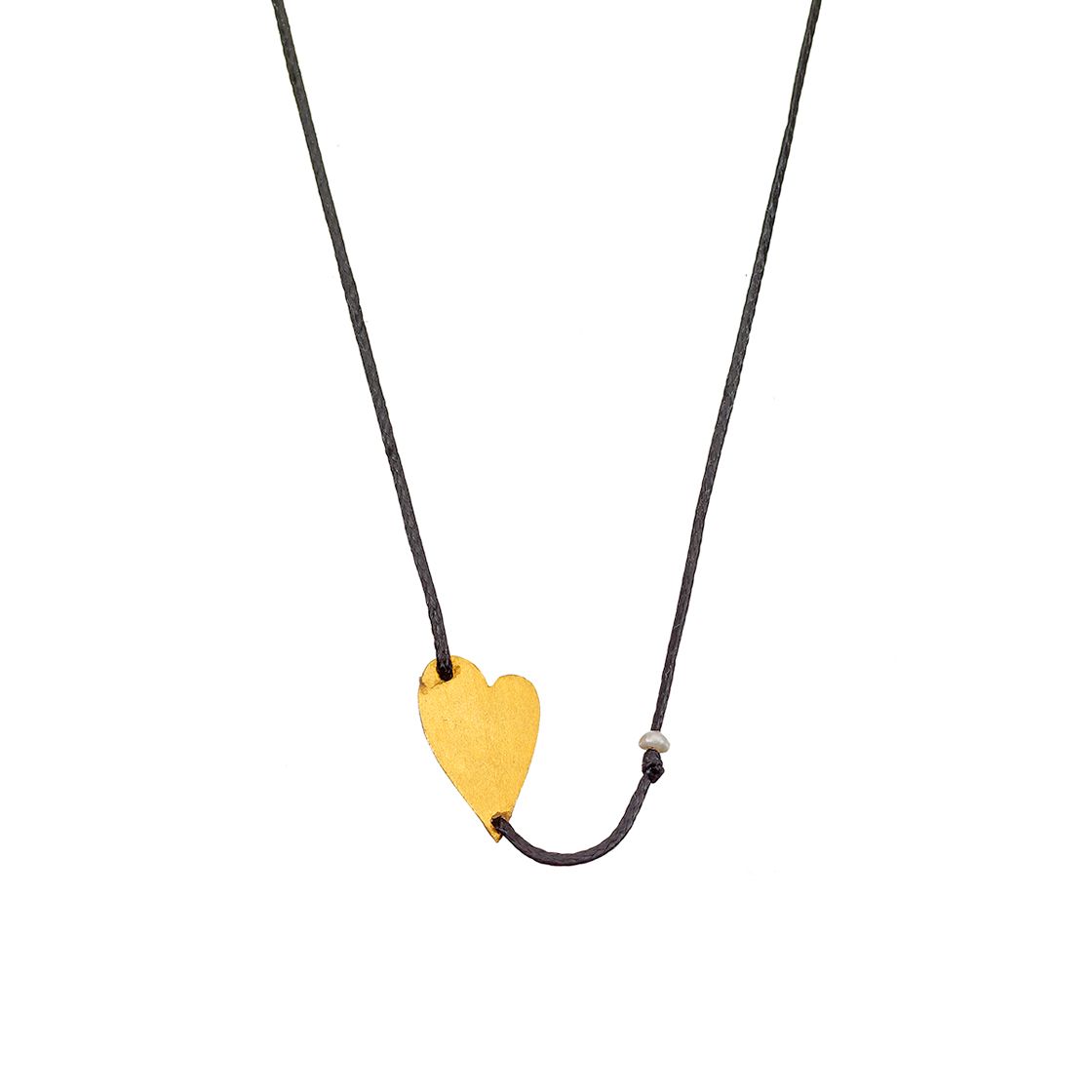 Double-pierced gold heart charm with pearl on black waxed cord.