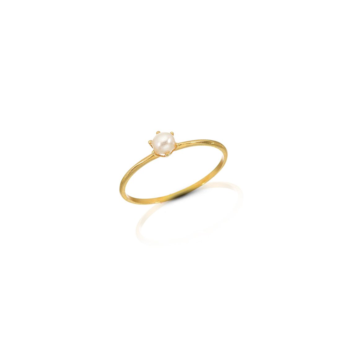 Gold solitare ring set with a pearl.