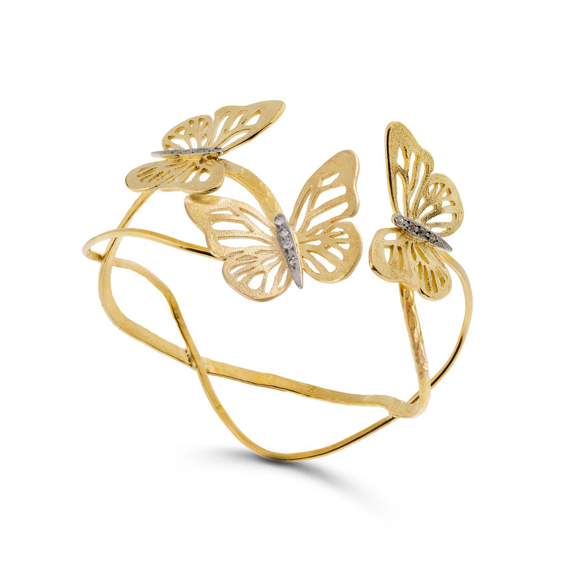 Playful butterflies bookend this gold wrap bracelet set with zircon stones.