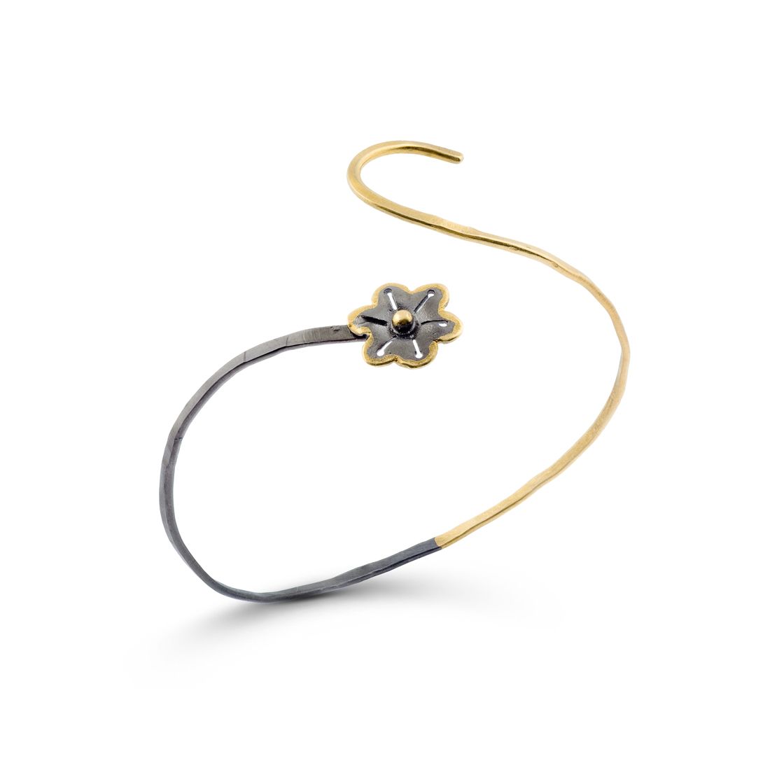 Black and gold daisy bookend a bi-colored gold wire adjustable bracelet.