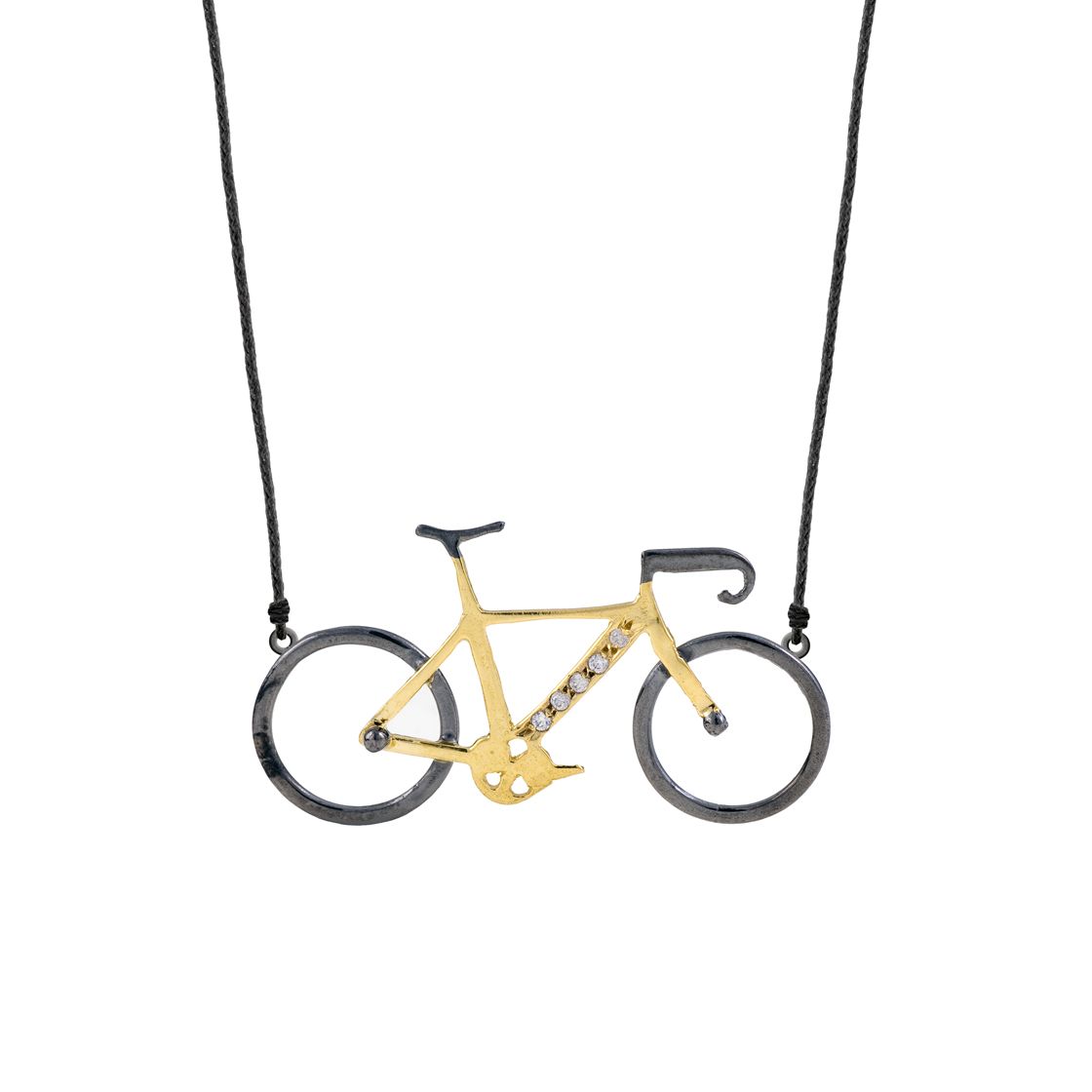 This charming and playful gold and black-plated bicycle set with zircon stone will brighten any outfit.