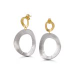 Large silver and gold open circle earrings with lightly hammered matte finish.