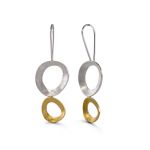 Silver and gold open circle dangle earrings with lightly hammered matte finish.