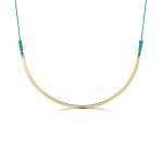 A beautifull and elegant shiny gold bar necklace on an adjustable cord