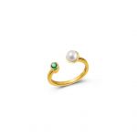 Adjustable elegant ring with a pearl and a bezel set green zircon stone.
