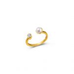 Adjustable elegant ring with a pearl and a bezel set zircon stone.